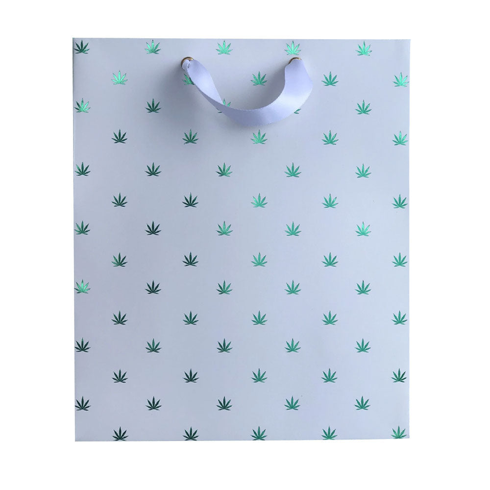 Cannabis Themed Gift Bags The New Polka Dot gift bag by KushKards features a green pot leaf pattern and a white ribbon handle to customize your gift wrapping.